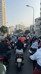 Dense motorbike traffic documented on Ho Chi Minh City street