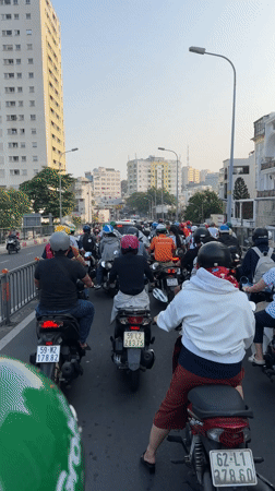 Dense motorbike traffic documented on Ho Chi Minh City street