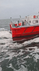 Pilot boat navigates choppy waters near Cuxhaven harbor