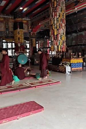 Inside and around a Kathmandu Buddhist monastery on a July morning