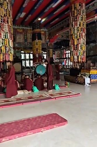 Inside and around a Kathmandu Buddhist monastery on a July morning