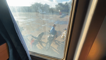 Evening ferry boarding operations documented at Phan Thiết port