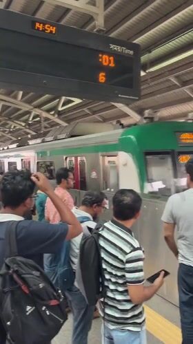 Morning commuters use Dhaka Metro Rail station