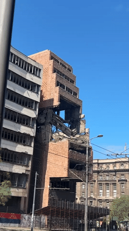 Damaged building with missing facade documented in Belgrade