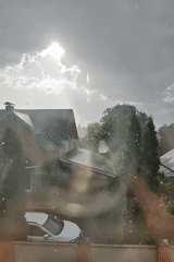 Rain shower documented in residential Hadiach, Ukraine