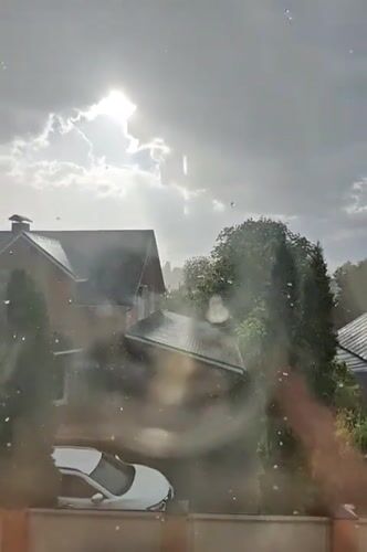 Rain shower documented in residential Hadiach, Ukraine