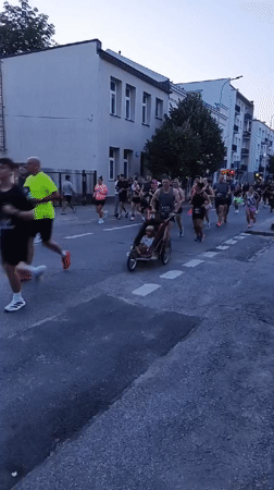 Evening street race winds through Piaseczno with police and crowds