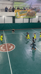 Youth soccer teams play indoor match in Wilde, Argentina