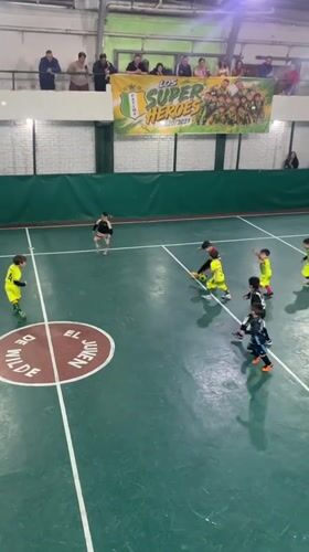 Youth soccer teams play indoor match in Wilde, Argentina