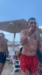Foam party draws young adults to Tel Aviv beach