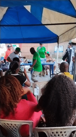 Political gathering draws crowds under tent in Aba, Nigeria