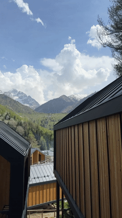Mountain landscape filmed from wooden building in Almaty