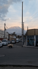 Evening street activity and mountain views documented in Arequipa