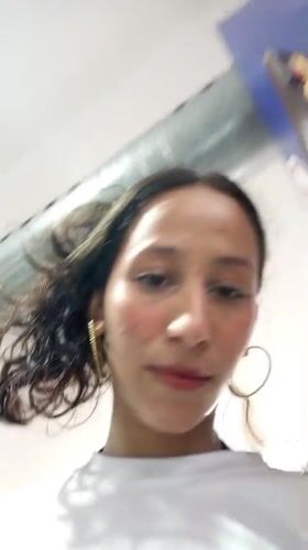 Woman shops for groceries and snacks in Porlamar store