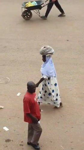 Bukuru street life: goods, foot traffic, and market activity