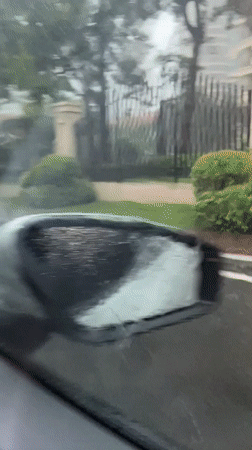 Rainy evening car ride through Huizhou with candid in-vehicle moments