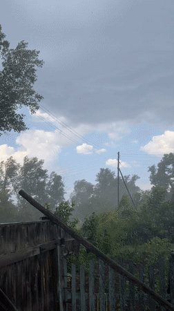 Stormy, foggy morning settles over a rural Russian village