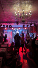 Band "Noisy River" performs to dancing crowd at Saint Petersburg restaurant