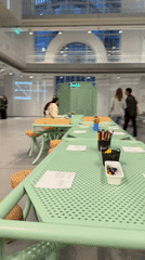 Art workspace and business meeting observed in Moscow building