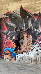 Man climbs Dragon Ball Z mural wall in Barcelona
