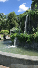 Park visit with waterfall and metallic animal sculpture in Kharkiv