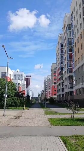Sunny morning stroll through a colorful Yekaterinburg neighborhood park