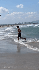Friday morning beach activities draw crowds to Acre shoreline