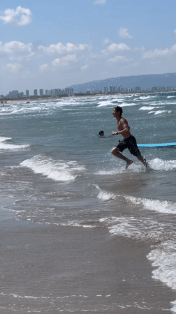 Friday morning beach activities draw crowds to Acre shoreline