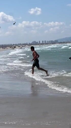 Friday morning beach activities draw crowds to Acre shoreline