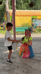 Clown leads hula hoop activity at Chaikovsky summer event