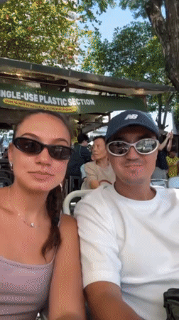 Couple records video at outdoor George Town venue