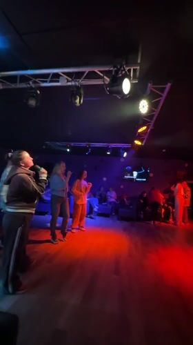 Karaoke night captured at Peresvet bar with hookah smoking