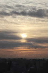Cloudy sunrise breaks over a Rubtsovsk suburb