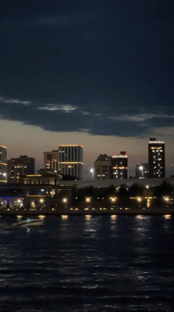 Kazan's riverfront alive on a dramatic summer evening