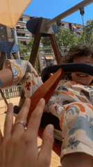 Child enjoys swing time at Barcelona playground