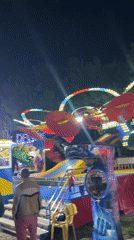 Evening amusement park fun in Kiten with rides and sunset views