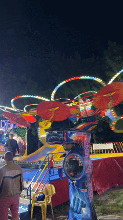 Evening amusement park fun in Kiten with rides and sunset views