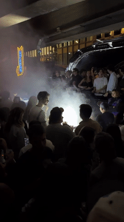 Late night DJ set in Paris with fog effects