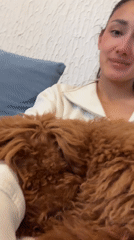 Woman and poodle share quiet morning moments in Montenegro