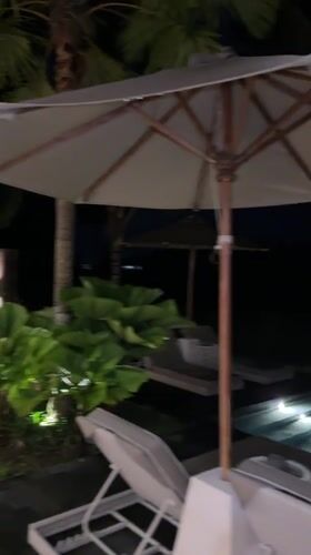 Nighttime pool and interior scenes captured in Sukawati, Indonesia