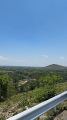 Tourists photograph scenic overlook in Ban Thung Ma Nio Thailand