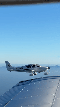 Wing-mounted camera catches two planes flying in formation