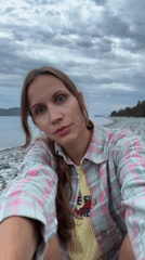 Woman documents beach visit in Fethiye, Turkey coastline