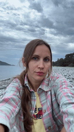 Woman documents beach visit in Fethiye, Turkey coastline