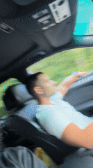 Passengers relaxing inside a car near Gabrovo, Bulgaria