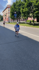 Half-marathon race with street band and traditional performers