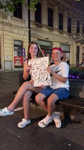 Caricature artist at work on Belgrade's main pedestrian street