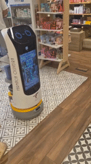 Delivery robot doing its rounds inside a Barcelos pharmacy
