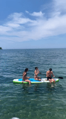 Paddleboarding and beachside dining at Pozzarello