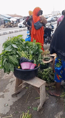 Market vendors, construction work documented in afternoon scenes